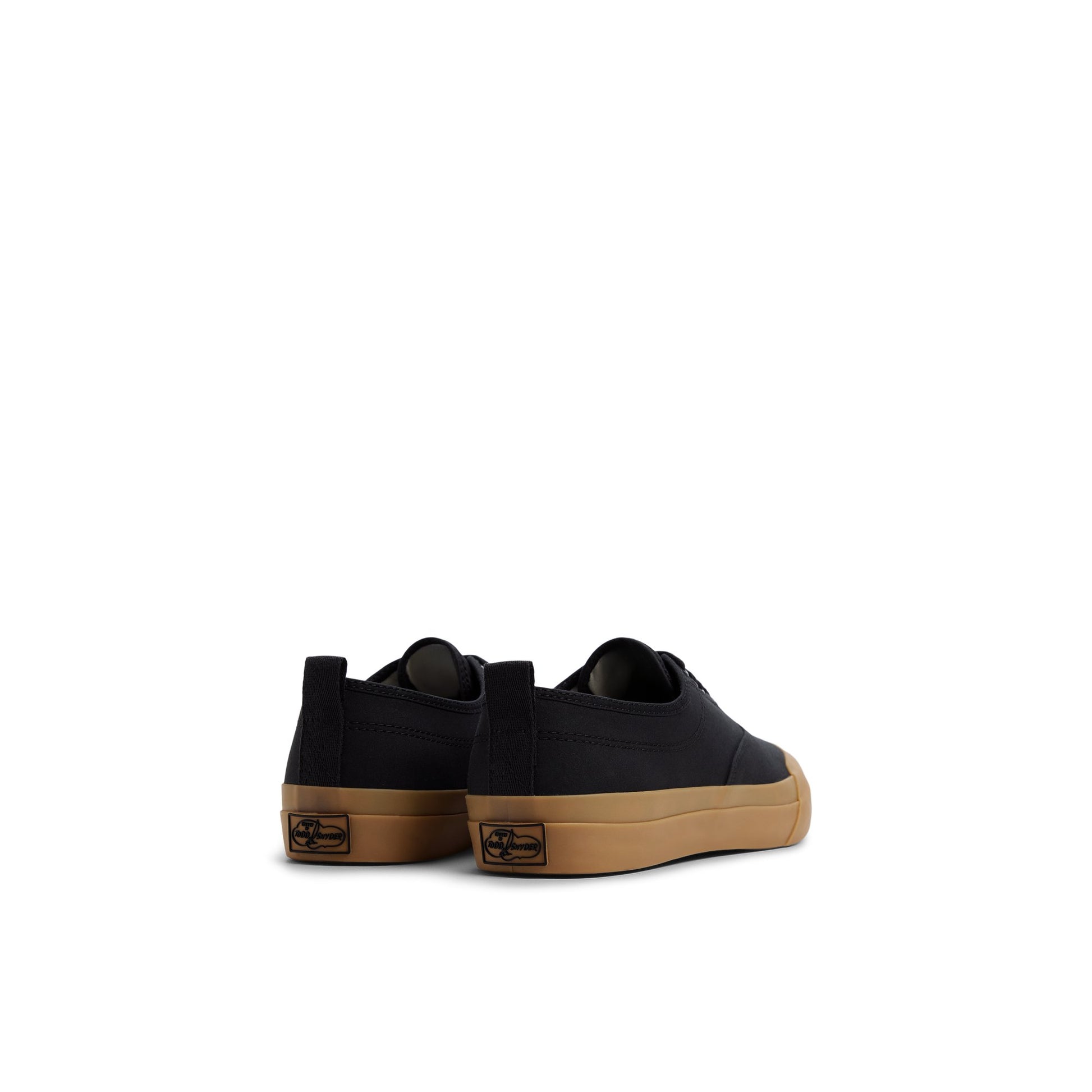Three-quarter angle of Black Sperry x Todd Snyder CVO Sneakers CVO Sneakers's front side