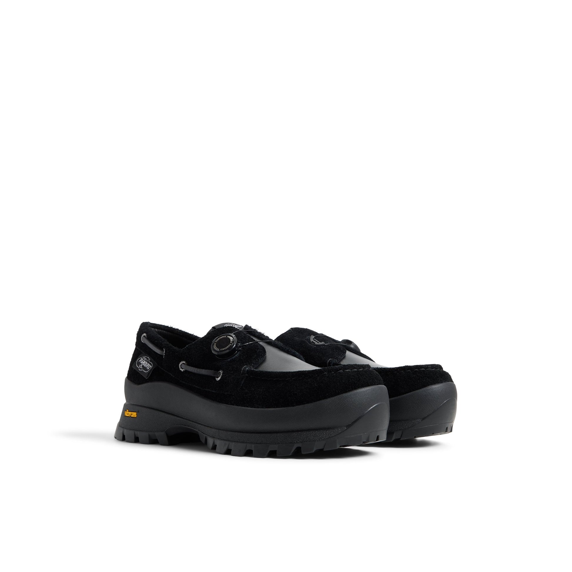 Side view of Black Sperry x Pleasures 3-Eye Vibram Turn-Lock Lug Boat Boat Shoe