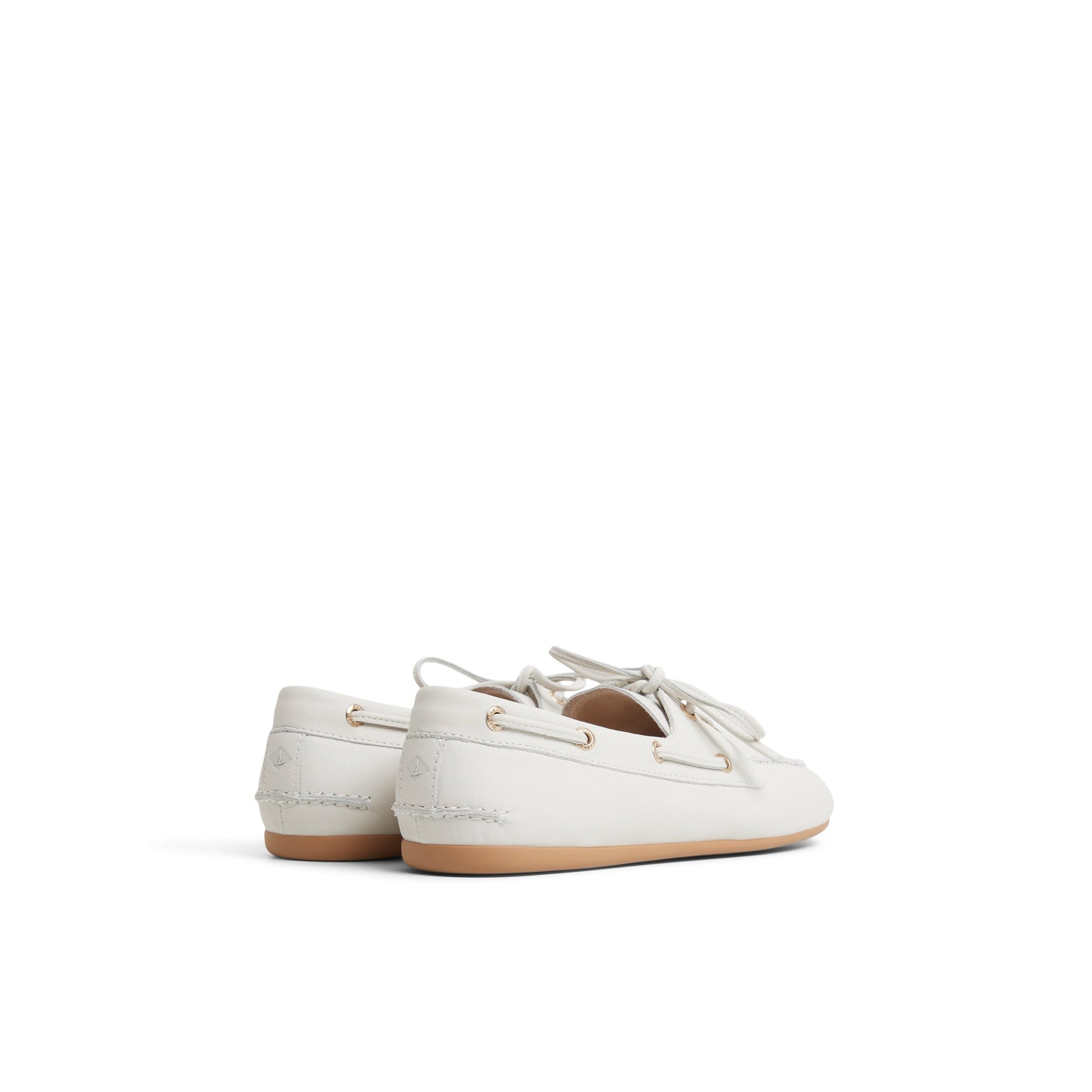 Three-quarter angle of Cream Sperry x Aritzia Slim Boat Shoe Boat Shoe's front side