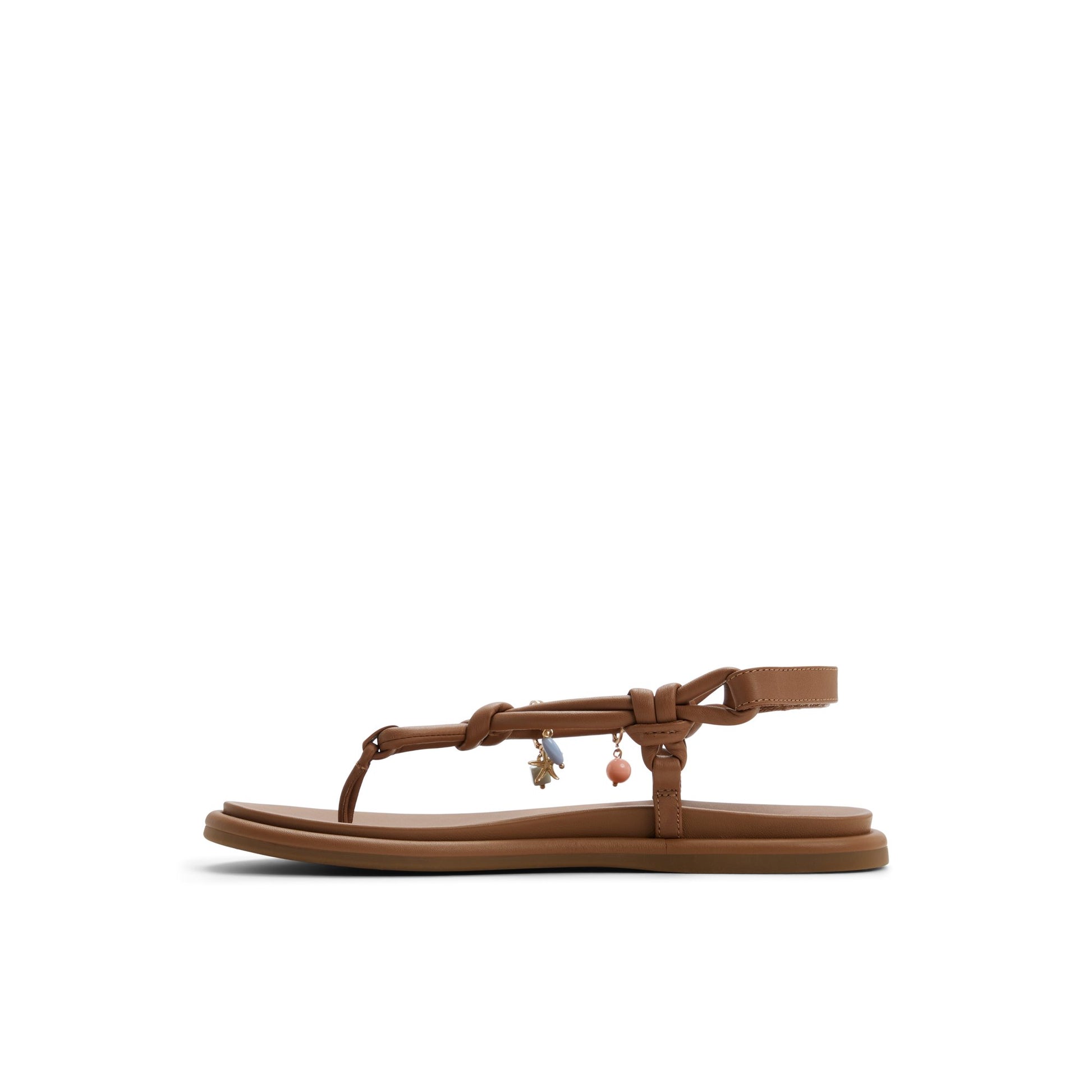 Three-quarter angle of Tan Isla T-bar Sandal T-Strap Flat Sandals's back side