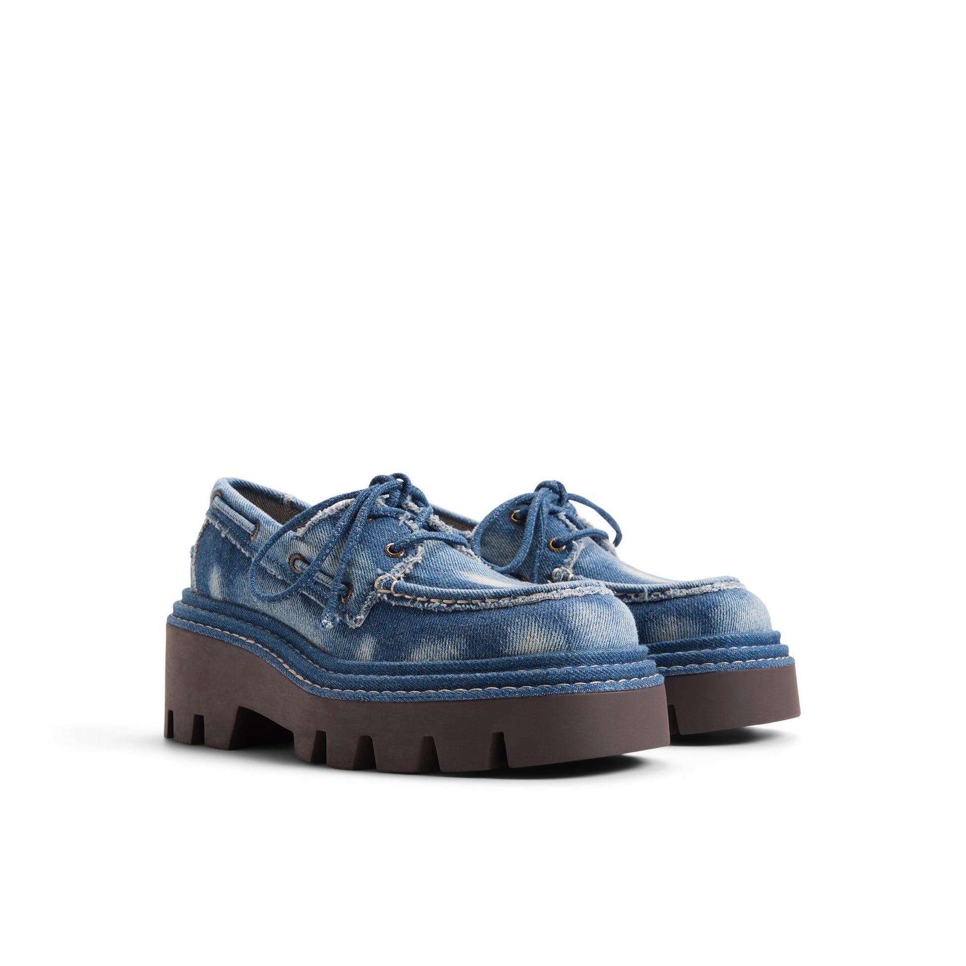 Side view of Denim Sperry x MONSE Authentic Original™ 2-Eye Lug Boat Shoe