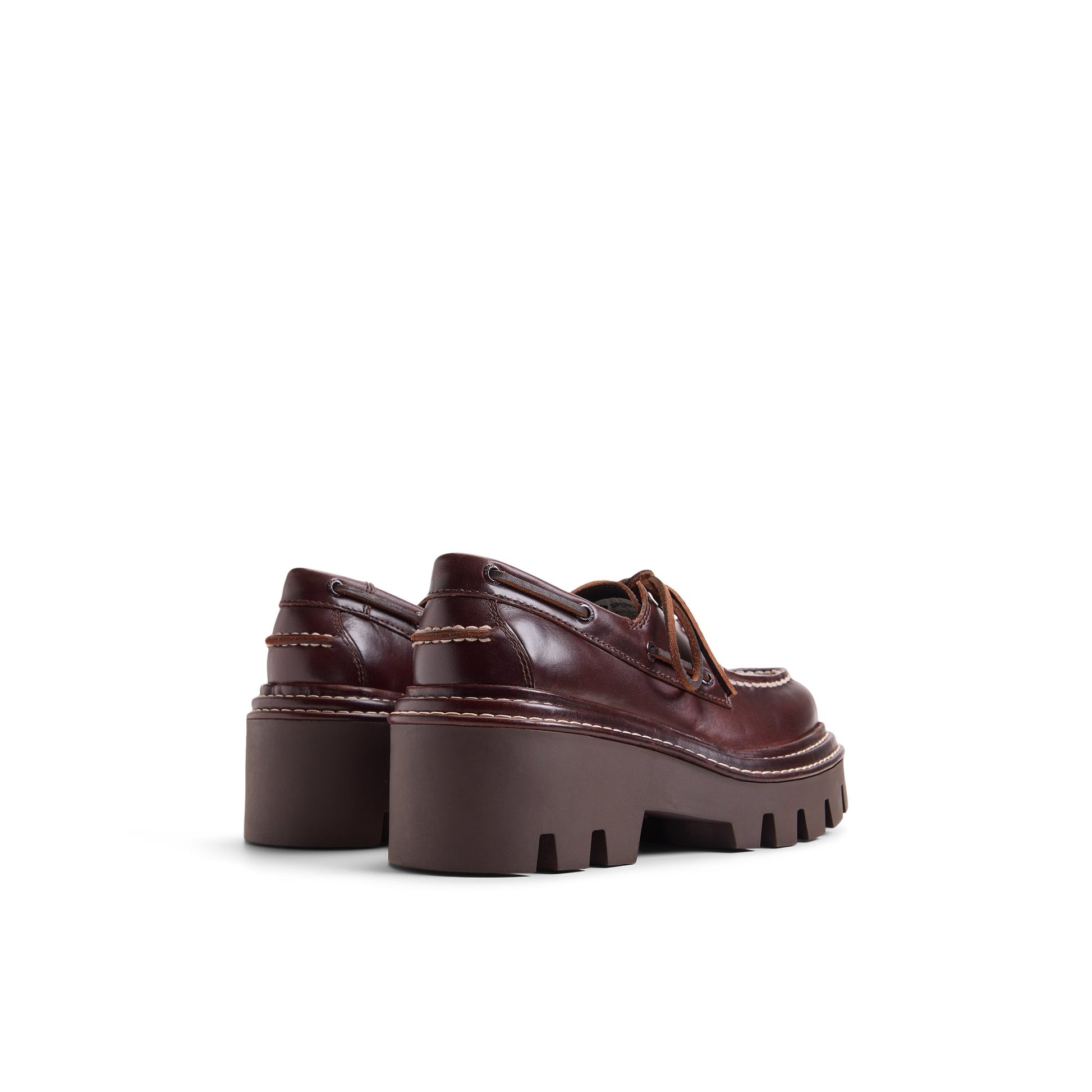 Three-quarter angle of Amaretto Sperry x MONSE Authentic Original™ 2-Eye Lug Boat Shoe 's front side