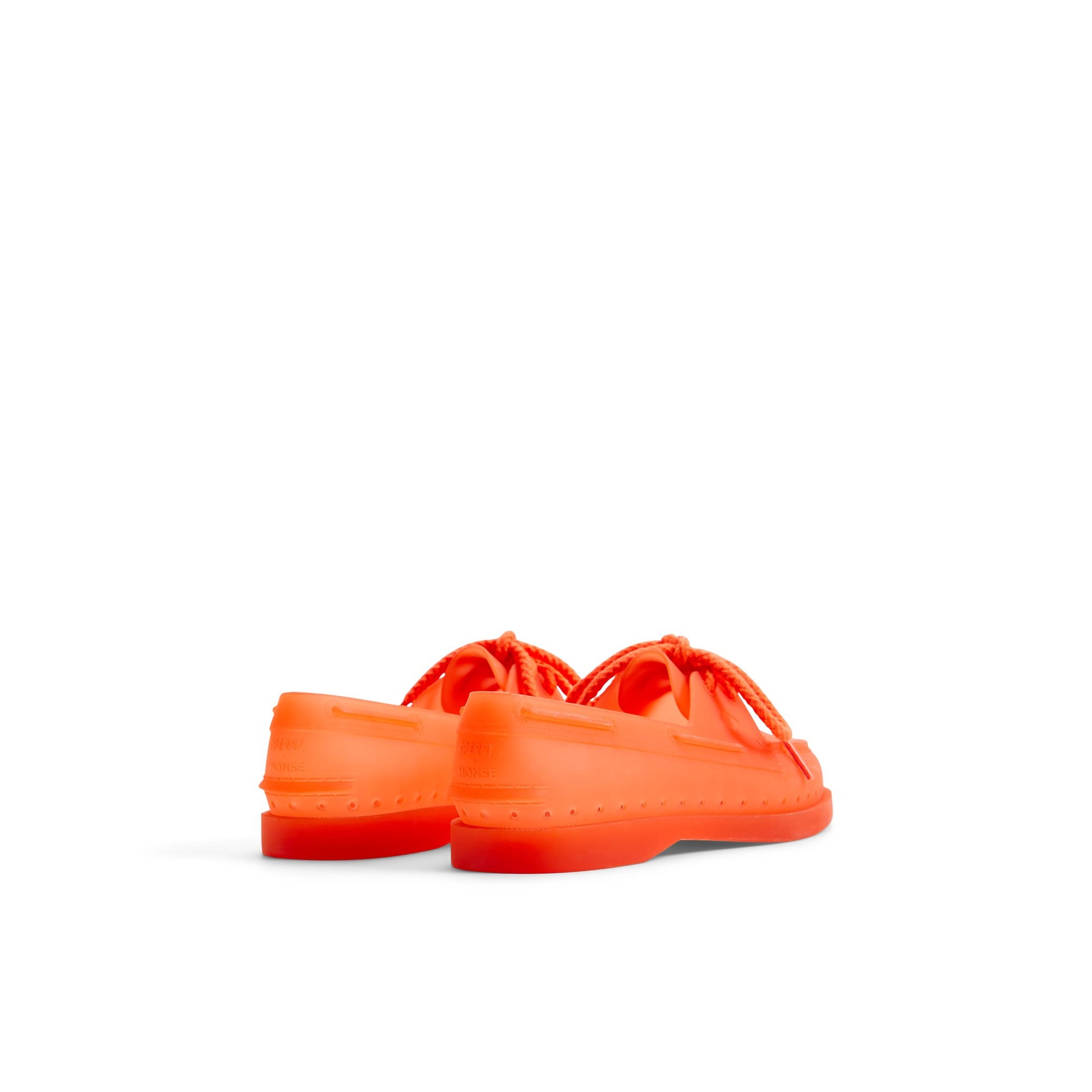 Three-quarter angle of Bright orange Sperry x MONSE Authentic Original™ 2-Eye Jelly Boat Shoe 's front side
