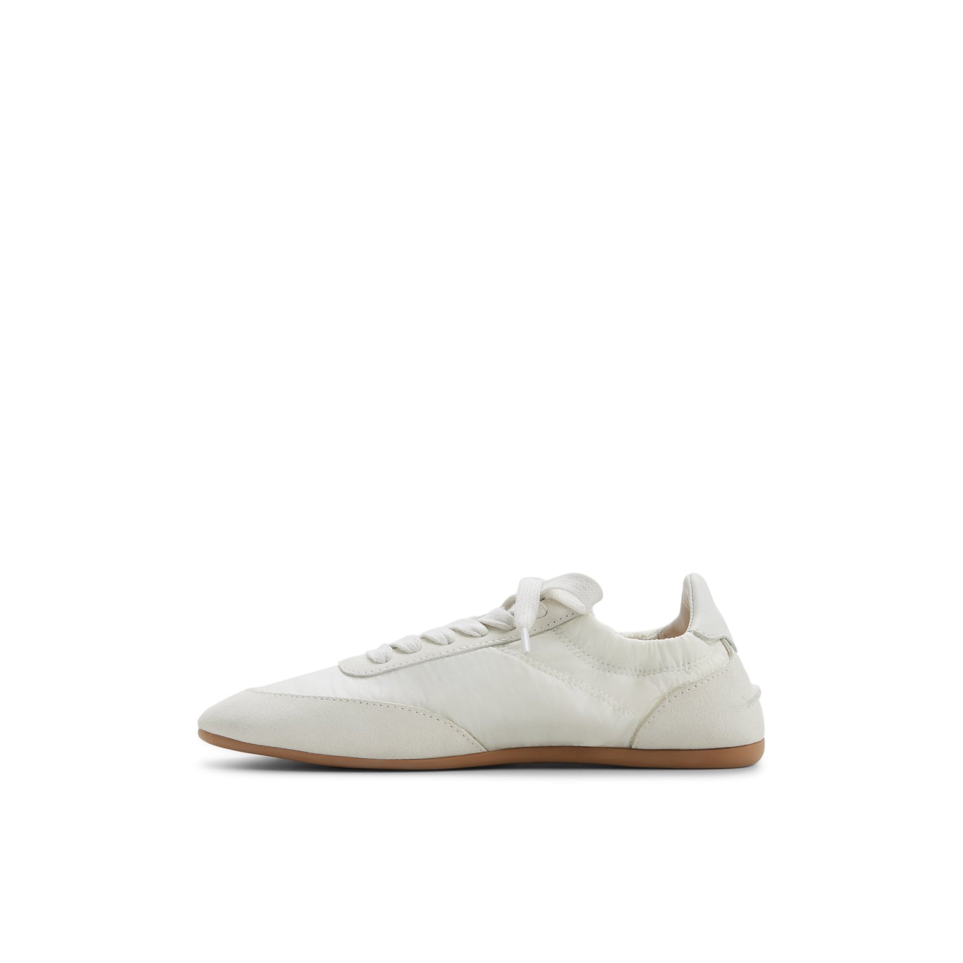 Three-quarter angle of Ivory Sperry x Aritzia Slim Jogger Low Top Sneakers's back side