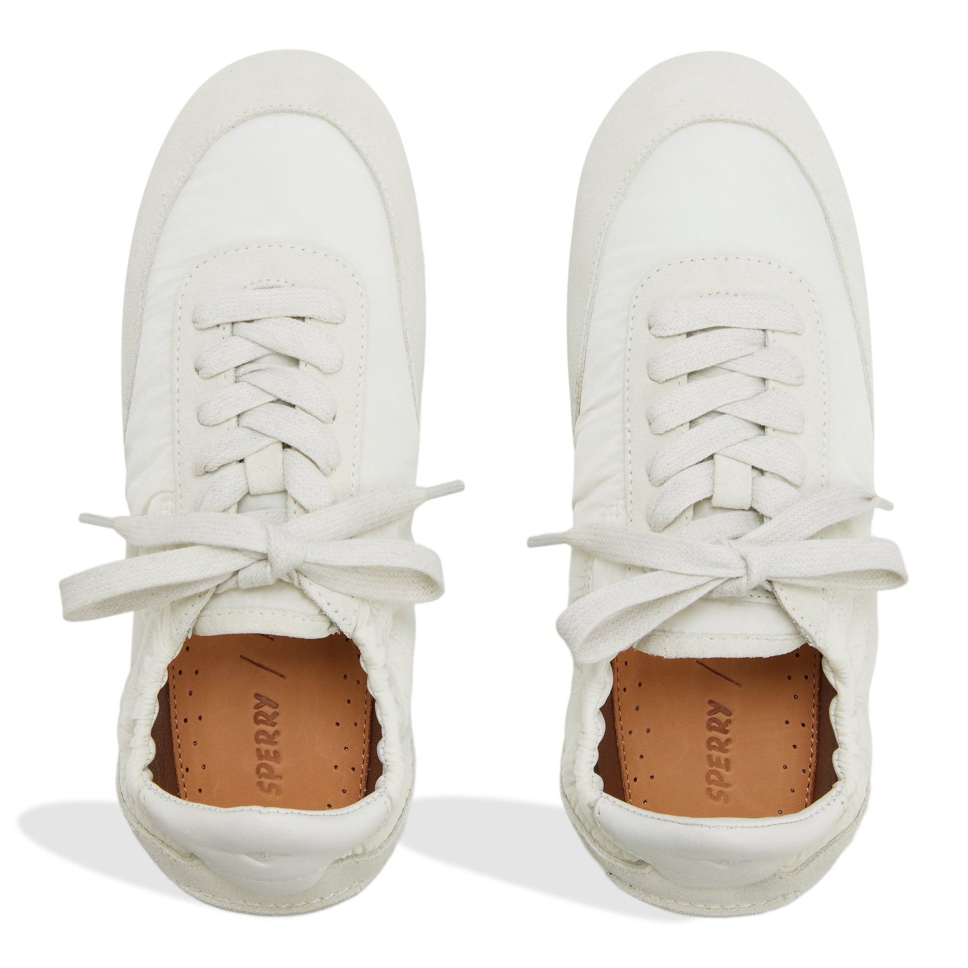 Top-down view of the Ivory Sperry x Aritzia Slim Jogger Low Top Sneakers