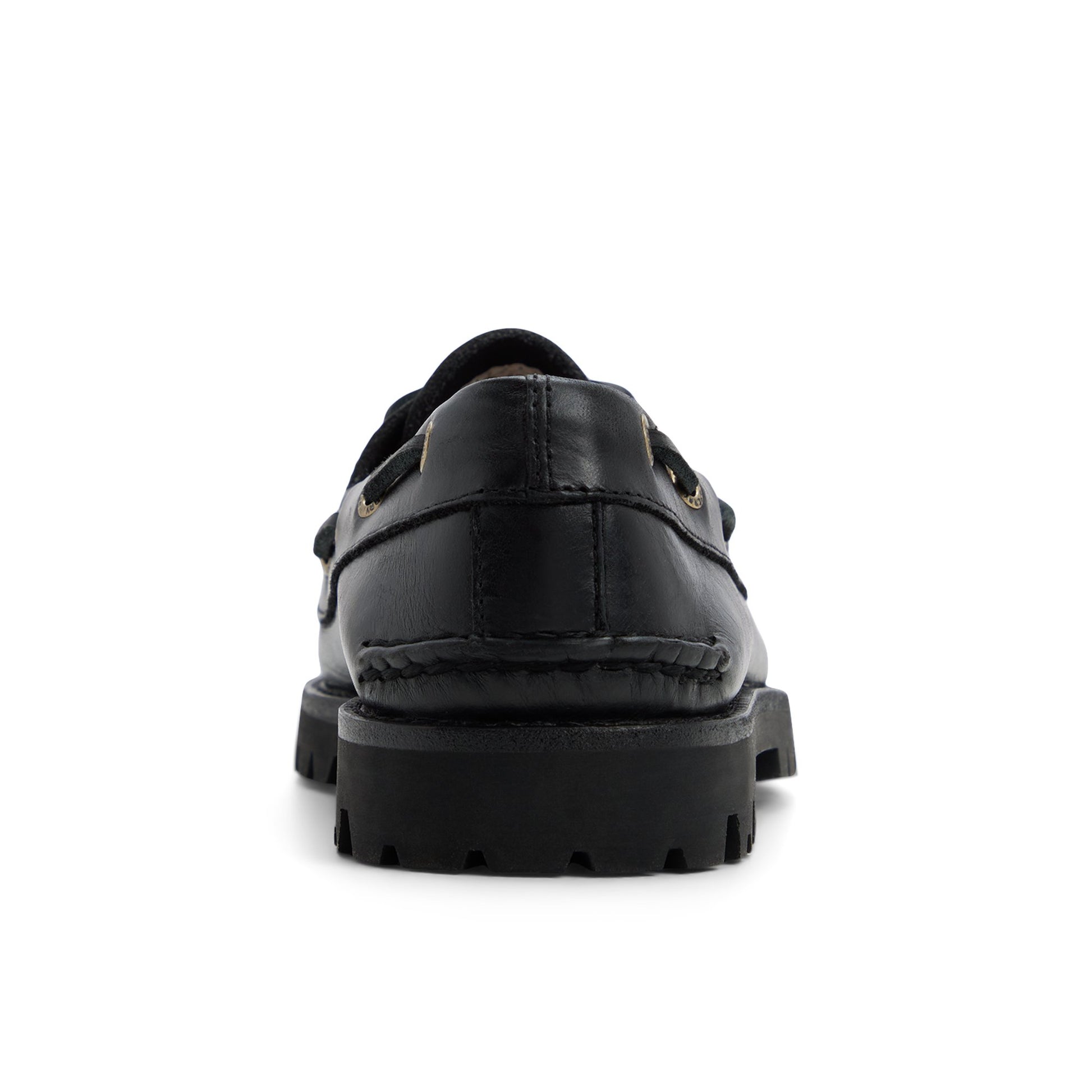 Three-quarter angle of Black Authentic Original™ Kiltie Lug Loafer 's front side